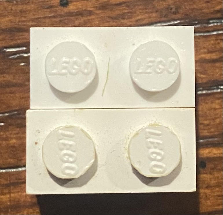 1x2 brick logo differences